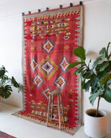 Vintage kilim rug in living room setting, bright colors, wild shaman, soft rug, bold color, Portland, Oregon, rug store, rug shop, local shop, vintage rug, modern kilim