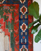 Vintage Turkish rug in a living room setting, pile rug, Turkish rug, vintage rug, portland, rug shop, bright colors, wild shaman, soft rug, bold color, Portland, Oregon, rug store, rug shop, local shop