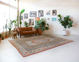 Vintage Turkish rug in living room setting, old rug, antique rug, pastel colors, faded colors, Turkish rug, vintage rug, soft rug, Portland, Oregon, rug store, rug shop, local shop