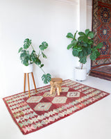 Vintage kilim rug in room decor setting, old rug, antique rug, pastel colors, faded colors, Turkish rug, vintage rug, soft rug, Portland, Oregon, rug store, rug shop, local shop, bold colors, bright colors