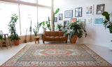 Vintage Turkish rug in living room setting, old rug, antique rug, pastel colors, faded colors, Turkish rug, vintage rug, soft rug, Portland, Oregon, rug store, rug shop, local shop