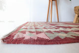 Vintage kilim rug in room decor setting, old rug, antique rug, pastel colors, faded colors, Turkish rug, vintage rug, soft rug, Portland, Oregon, rug store, rug shop, local shop, bold colors, bright colors