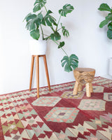 Vintage kilim rug in room decor setting, old rug, antique rug, pastel colors, faded colors, Turkish rug, vintage rug, soft rug, Portland, Oregon, rug store, rug shop, local shop, bold colors, bright colors