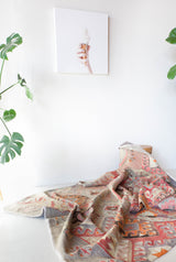 Vintage kilim rug in room decor setting, old rug, antique rug, pastel colors, faded colors, Turkish rug, vintage rug, soft rug, Portland, Oregon, rug store, rug shop, local shop, bold colors, bright colors