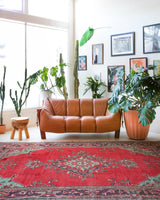 Vintage Turkish rug in a living room setting, pile rug, Turkish rug, vintage rug, portland, rug shop, bright colors, wild shaman, soft rug, bold color, Portland, Oregon, rug store, rug shop, local shop, antique rug