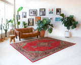 Vintage Turkish rug in a living room setting, pile rug, Turkish rug, vintage rug, portland, rug shop, bright colors, wild shaman, soft rug, bold color, Portland, Oregon, rug store, rug shop, local shop, antique rug