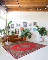 Vintage Turkish rug in a living room setting, pile rug, Turkish rug, vintage rug, portland, rug shop, bright colors, wild shaman, soft rug, bold color, Portland, Oregon, rug store, rug shop, local shop, antique rug