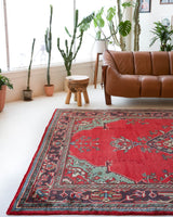 Vintage Turkish rug in a living room setting, pile rug, Turkish rug, vintage rug, portland, rug shop, bright colors, wild shaman, soft rug, bold color, Portland, Oregon, rug store, rug shop, local shop, antique rug