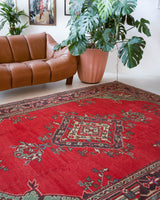 Vintage Turkish rug in a living room setting, pile rug, Turkish rug, vintage rug, portland, rug shop, bright colors, wild shaman, soft rug, bold color, Portland, Oregon, rug store, rug shop, local shop, antique rug