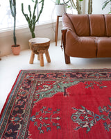 Vintage Turkish rug in a living room setting, pile rug, Turkish rug, vintage rug, portland, rug shop, bright colors, wild shaman, soft rug, bold color, Portland, Oregon, rug store, rug shop, local shop, antique rug