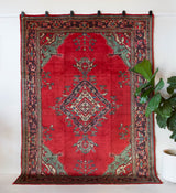 Vintage Turkish rug in a living room setting, pile rug, Turkish rug, vintage rug, portland, rug shop, bright colors, wild shaman, soft rug, bold color, Portland, Oregon, rug store, rug shop, local shop, antique rug