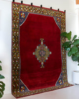 Vintage Turkish rug in a living room setting, pile rug, Turkish rug, vintage rug, portland, rug shop, bright colors, wild shaman, soft rug, bold color, Portland, Oregon, rug store, rug shop, local shop, antique rug