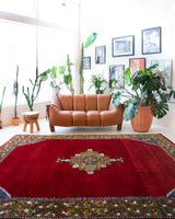 Vintage Turkish rug in a living room setting, pile rug, Turkish rug, vintage rug, portland, rug shop, bright colors, wild shaman, soft rug, bold color, Portland, Oregon, rug store, rug shop, local shop, antique rug