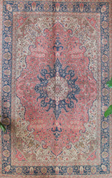 Vintage Turkish rug in living room setting, old rug, antique rug, pastel colors, faded colors, Turkish rug, vintage rug, soft rug, Portland, Oregon, rug store, rug shop, local shop