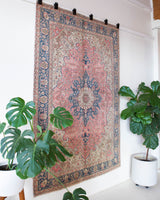 Vintage Turkish rug in living room setting, old rug, antique rug, pastel colors, faded colors, Turkish rug, vintage rug, soft rug, Portland, Oregon, rug store, rug shop, local shop