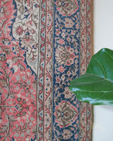 Vintage Turkish rug in living room setting, old rug, antique rug, pastel colors, faded colors, Turkish rug, vintage rug, soft rug, Portland, Oregon, rug store, rug shop, local shop