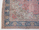Vintage Turkish rug in living room setting, old rug, antique rug, pastel colors, faded colors, Turkish rug, vintage rug, soft rug, Portland, Oregon, rug store, rug shop, local shop