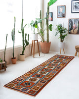 Vintage Turkish runner rug in a living room setting, pile rug, Turkish rug, vintage rug, portland, rug shop, bright colors, wild shaman, soft rug, bold color, Portland, Oregon, rug store, rug shop, local shop, antique rug