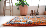 Vintage Turkish runner rug in a living room setting, pile rug, Turkish rug, vintage rug, portland, rug shop, bright colors, wild shaman, soft rug, bold color, Portland, Oregon, rug store, rug shop, local shop, antique rug