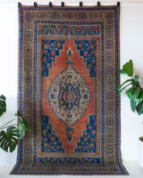 Vintage Turkish rug in a living room setting, pile rug, Turkish rug, vintage rug, portland, rug shop, bright colors, wild shaman, soft rug, bold color, Portland, Oregon, rug store, rug shop, local shop, antique rug