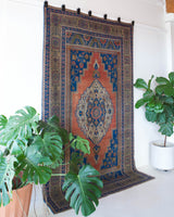 Vintage Turkish rug in a living room setting, pile rug, Turkish rug, vintage rug, portland, rug shop, bright colors, wild shaman, soft rug, bold color, Portland, Oregon, rug store, rug shop, local shop, antique rug