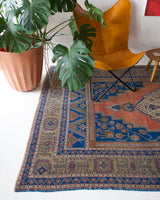 Vintage Turkish rug in a living room setting, pile rug, Turkish rug, vintage rug, portland, rug shop, bright colors, wild shaman, soft rug, bold color, Portland, Oregon, rug store, rug shop, local shop, antique rug
