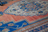 Vintage Turkish rug in a living room setting, pile rug, Turkish rug, vintage rug, portland, rug shop, bright colors, wild shaman, soft rug, bold color, Portland, Oregon, rug store, rug shop, local shop, antique rug