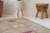 Vintage Turkish runner rug in living room setting, old rug, antique rug, pastel colors, faded colors, Turkish rug, vintage rug, soft rug, Portland, Oregon, rug store, rug shop, local shop