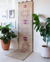 Vintage Turkish runner rug in living room setting, old rug, antique rug, pastel colors, faded colors, Turkish rug, vintage rug, soft rug, Portland, Oregon, rug store, rug shop, local shop