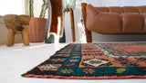 Vintage Turkish rug in a living room setting, pile rug, Turkish rug, vintage rug, portland, rug shop, bright colors, wild shaman, soft rug, bold color, Portland, Oregon, rug store, rug shop, local shop