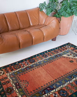 Vintage Turkish rug in a living room setting, pile rug, Turkish rug, vintage rug, portland, rug shop, bright colors, wild shaman, soft rug, bold color, Portland, Oregon, rug store, rug shop, local shop