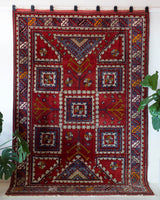 Vintage Turkish rug in a living room setting, pile rug, Turkish rug, vintage rug, portland, rug shop, bright colors, wild shaman, soft rug, bold color, Portland, Oregon, rug store, rug shop, local shop, antique rug
