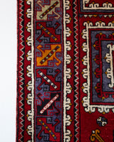 Vintage Turkish rug in a living room setting, pile rug, Turkish rug, vintage rug, portland, rug shop, bright colors, wild shaman, soft rug, bold color, Portland, Oregon, rug store, rug shop, local shop, antique rug
