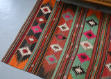 orange, green, bright color, antique, oushak rug, portland rug shop, rug store, wild shaman, cicim rug