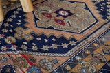 Vintage Turkish rug in living room setting, old rug, antique rug, pastel colors, faded colors, Turkish rug, vintage rug, soft rug, Portland, Oregon, rug store, rug shop, local shop