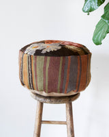 Floor pouf in a living room setting, pillow, turkish pillow, kilim pillow, home decor, decorative pillow, sham, rug pillow, decor, home decor, pouf, floor cushion, cushion, Portland, rugshop, Oregon, Wild Shaman, ottoman
