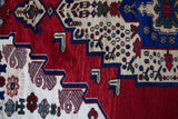 Vintage Turkish rug in a living room setting, pile rug, Turkish rug, vintage rug, portland, rug shop, bright colors, wild shaman, soft rug, bold color, Portland, Oregon, rug store, rug shop, local shop, antique rug