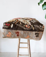 Floor pouf in a living room setting, pillow, turkish pillow, kilim pillow, home decor, decorative pillow, sham, rug pillow, decor, home decor, pouf, floor cushion, cushion, Portland, rugshop, Oregon, Wild Shaman, ottoman