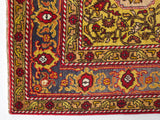 Vintage Turkish rug in a living room setting, pile rug, Turkish rug, vintage rug, portland, rug shop, bright colors, wild shaman, soft rug, bold color, Portland, Oregon, rug store, rug shop, local shop, antique rug, floral rug