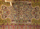 Vintage Turkish rug in a living room setting, pile rug, Turkish rug, vintage rug, portland, rug shop, bright colors, wild shaman, soft rug, bold color, Portland, Oregon, rug store, rug shop, local shop, antique rug, floral rug
