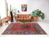 Vintage Turkish rug in a living room setting, pile rug, Turkish rug, vintage rug, portland, rug shop, bright colors, wild shaman, soft rug, bold color, Portland, Oregon, rug store, rug shop, local shop, antique rug