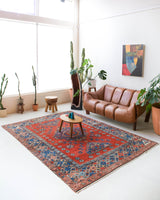Vintage Turkish rug in a living room setting, pile rug, Turkish rug, vintage rug, portland, rug shop, bright colors, wild shaman, soft rug, bold color, Portland, Oregon, rug store, rug shop, local shop, antique rug
