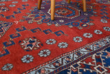 Vintage Turkish rug in a living room setting, pile rug, Turkish rug, vintage rug, portland, rug shop, bright colors, wild shaman, soft rug, bold color, Portland, Oregon, rug store, rug shop, local shop, antique rug