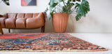 Vintage Turkish rug in a living room setting, pile rug, Turkish rug, vintage rug, portland, rug shop, bright colors, wild shaman, soft rug, bold color, Portland, Oregon, rug store, rug shop, local shop, antique rug