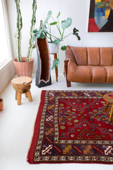 Vintage Turkish rug in a living room setting, pile rug, Turkish rug, vintage rug, portland, rug shop, bright colors, wild shaman, soft rug, bold color, Portland, Oregon, rug store, rug shop, local shop, antique rug