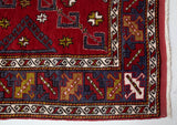 Vintage Turkish rug in a living room setting, pile rug, Turkish rug, vintage rug, portland, rug shop, bright colors, wild shaman, soft rug, bold color, Portland, Oregon, rug store, rug shop, local shop, antique rug