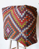 Floor pouf in a living room setting, pillow, turkish pillow, kilim pillow, home decor, decorative pillow, sham, rug pillow, decor, home decor, pouf, floor cushion, cushion, Portland, rugshop, Oregon, Wild Shaman, ottoman