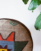 Floor pouf in a living room setting, pillow, turkish pillow, kilim pillow, home decor, decorative pillow, sham, rug pillow, decor, home decor, pouf, floor cushion, cushion, Portland, rugshop, Oregon, Wild Shaman, ottoman