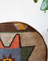 Floor pouf in a living room setting, pillow, turkish pillow, kilim pillow, home decor, decorative pillow, sham, rug pillow, decor, home decor, pouf, floor cushion, cushion, Portland, rugshop, Oregon, Wild Shaman, ottoman