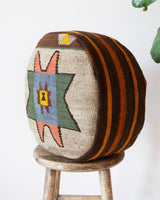 Floor pouf in a living room setting, pillow, turkish pillow, kilim pillow, home decor, decorative pillow, sham, rug pillow, decor, home decor, pouf, floor cushion, cushion, Portland, rugshop, Oregon, Wild Shaman, ottoman